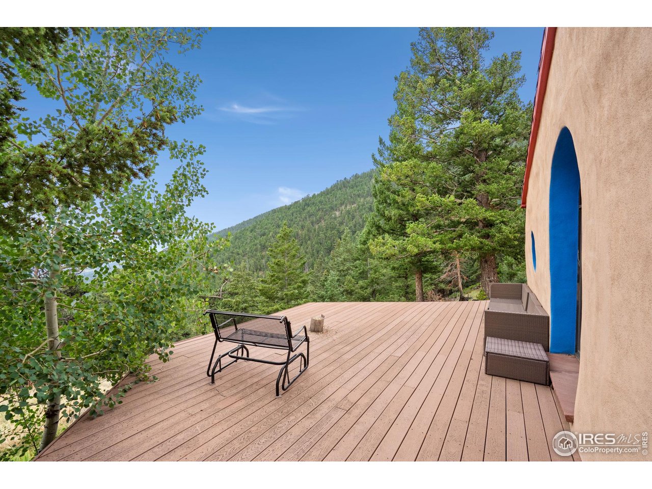 1000 Alaska Road Boulder, CO 80302 - Photo 41 of 50 a view of outdoor sitting area with furniture and wooden floor