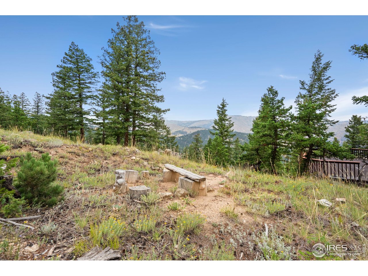 1000 Alaska Road Boulder, CO 80302 - Photo 44 of 50 a backyard of a house with lots of green space