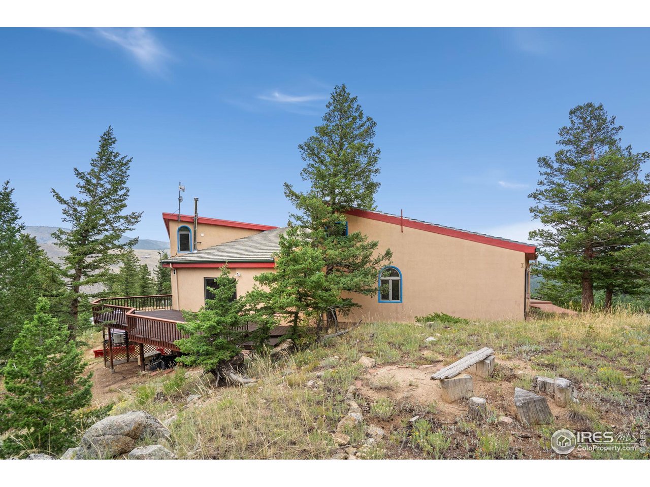 1000 Alaska Road Boulder, CO 80302 - Photo 45 of 50 a backyard of a house with plants and trees