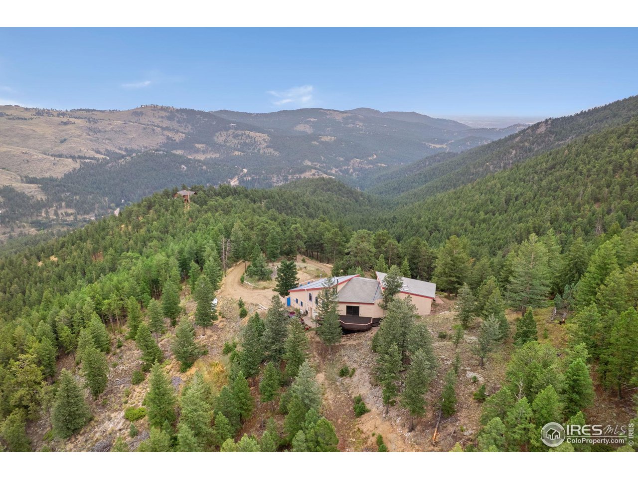 1000 Alaska Road Boulder, CO 80302 - Photo 46 of 50 a view of a town with mountains in the background