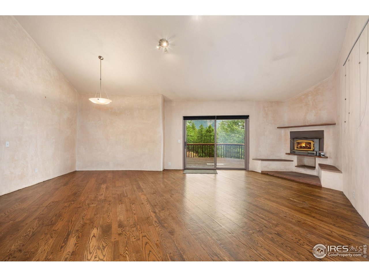 1000 Alaska Road Boulder, CO 80302 - Photo 6 of 50 a view of empty room with wooden floor and fan