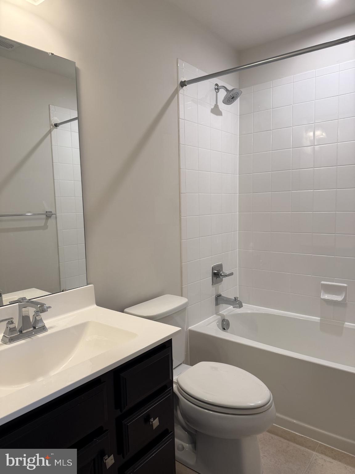 600 Judy Way Newark, DE 19713 - Photo 11 of 14 a bathroom with a sink a toilet and shower
