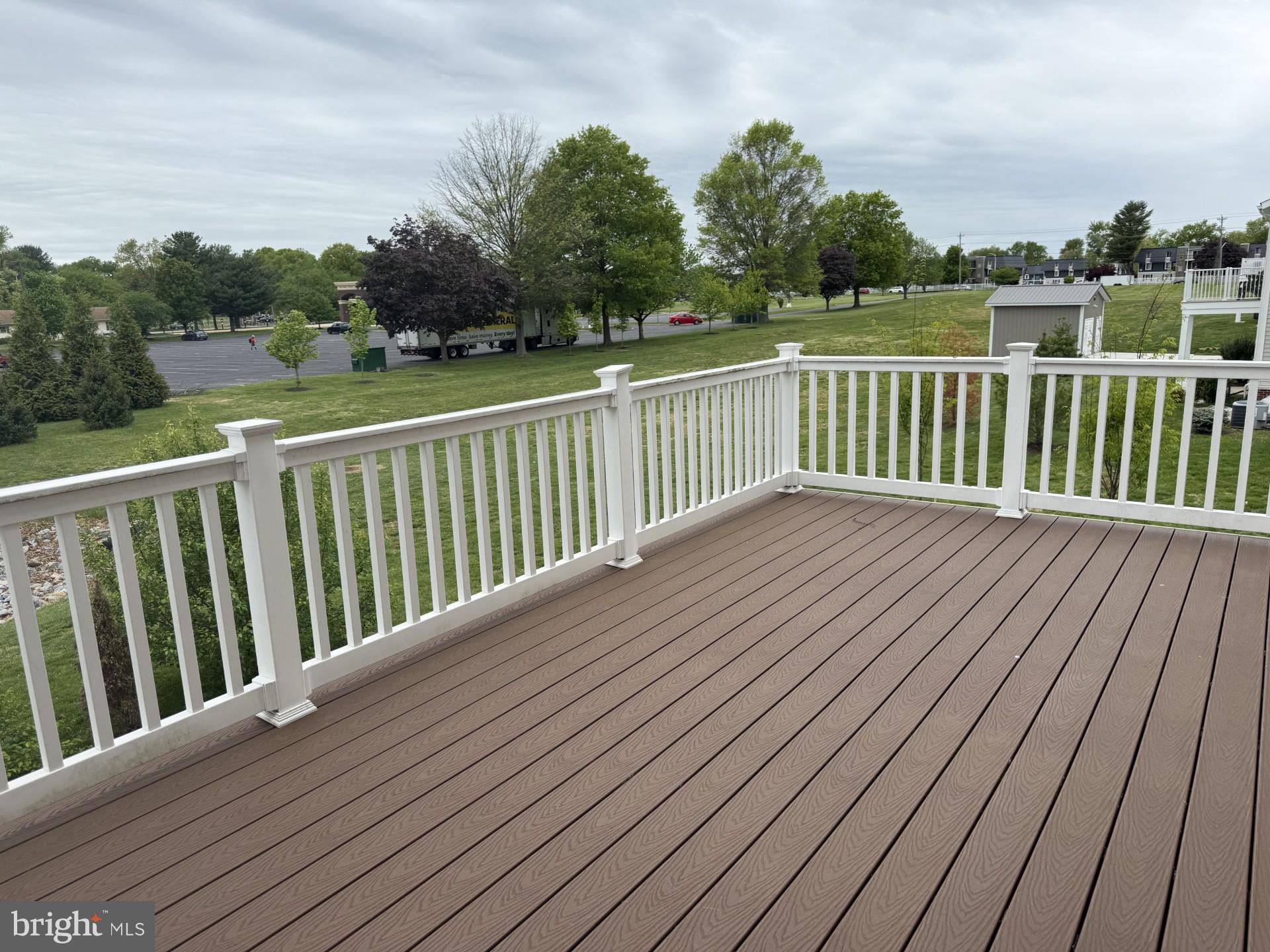 600 Judy Way Newark, DE 19713 - Photo 5 of 14 a balcony with wooden floor and fence