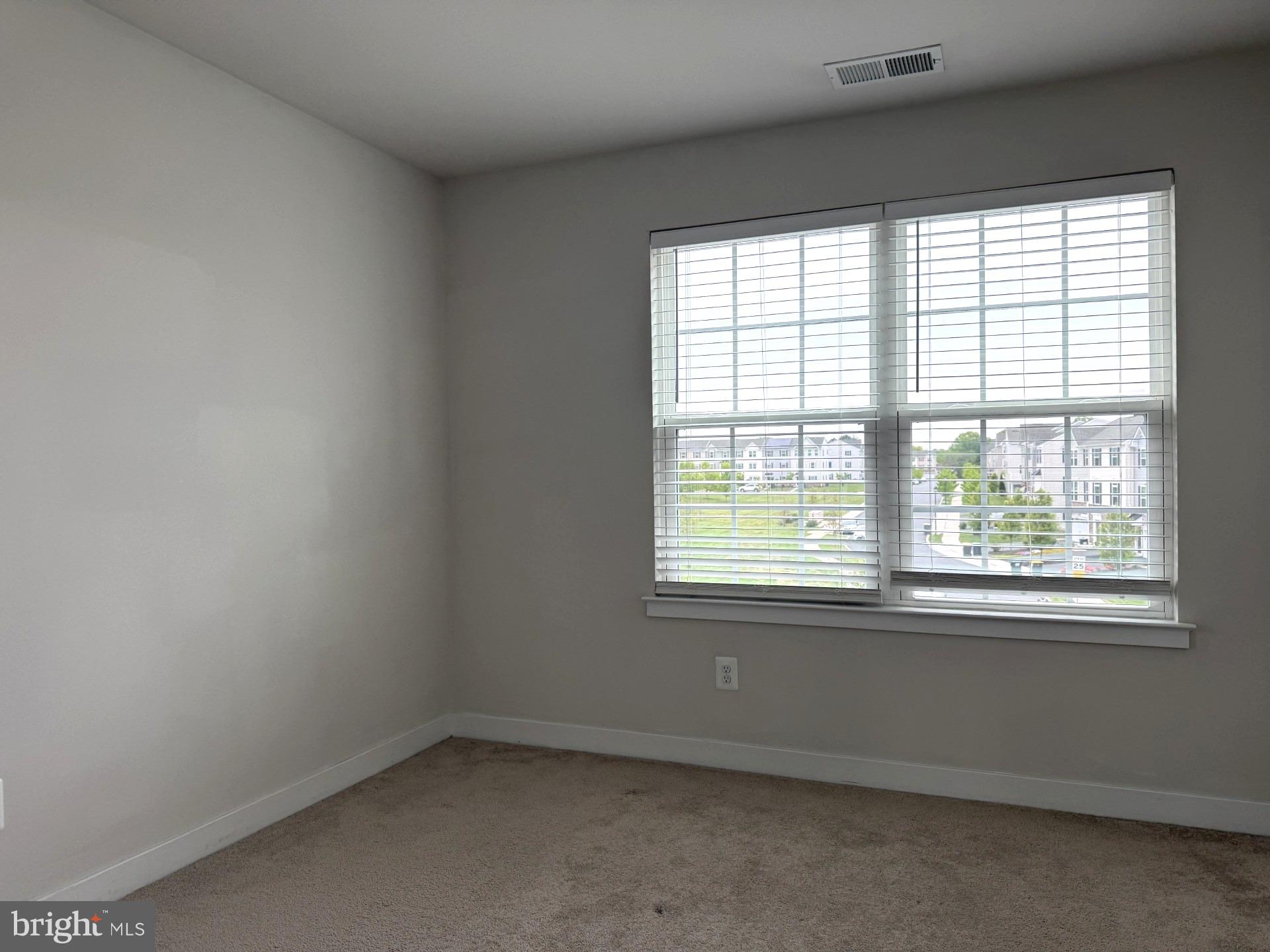 600 Judy Way Newark, DE 19713 - Photo 9 of 14 an empty room with a window