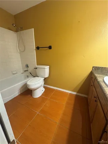 a bathroom with a sink and toilet
