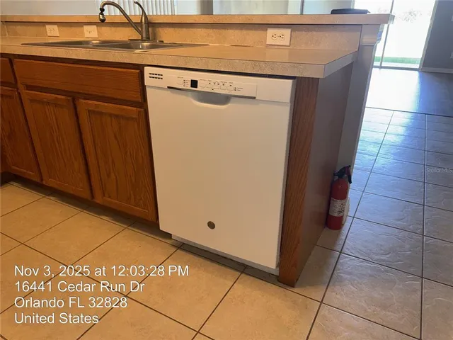 a view of a utility room with washer and dryer