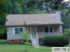 1151 Dunlap Roddey Road Rock Hill, SC 29730 - Photo 1 of 8 a view of a house with a yard and plants