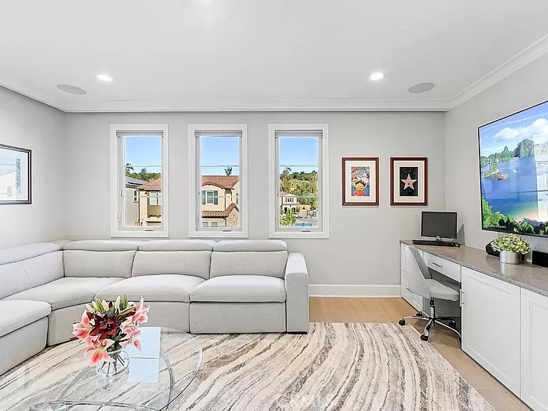 65 Rockinghorse Irvine, CA 92602 - Photo 20 of 45 a living room with furniture and a couch