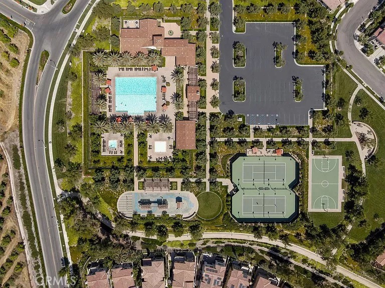 65 Rockinghorse Irvine, CA 92602 - Photo 38 of 45 an aerial view of a house with table and chairs