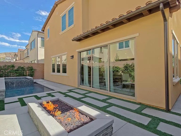 65 Rockinghorse Irvine, CA 92602 - Photo 45 of 45 a view of a two couches in the patio