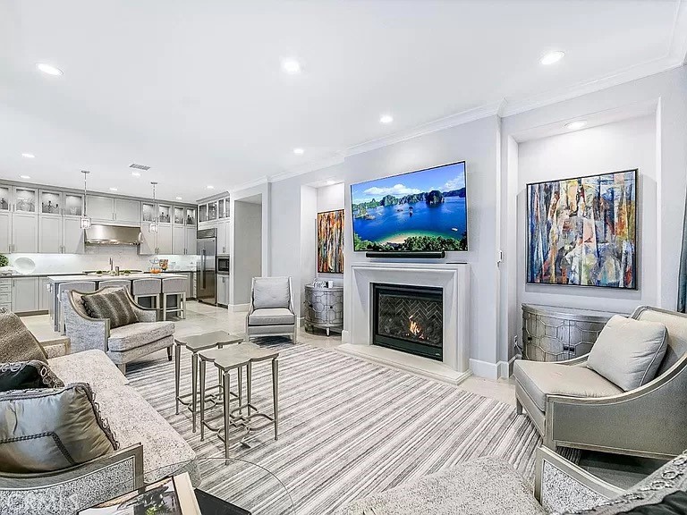 65 Rockinghorse Irvine, CA 92602 - Photo 7 of 45 a living room with furniture and a fireplace