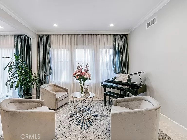 65 Rockinghorse Irvine, CA 92602 - Photo 9 of 45 a living room with furniture and a potted plant