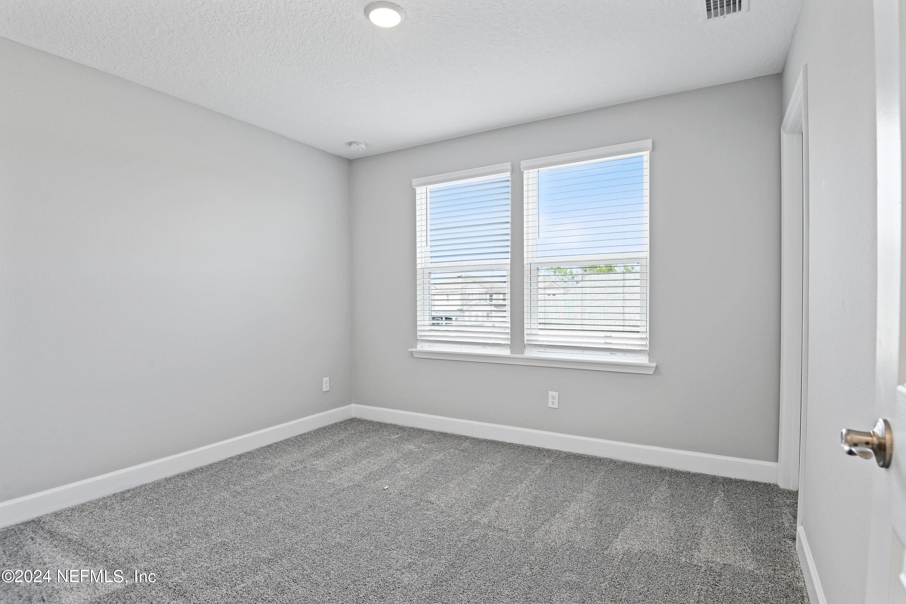 29 Cedar Elm Way St. Augustine, FL 32092 - Photo 12 of 28 an empty room with a window