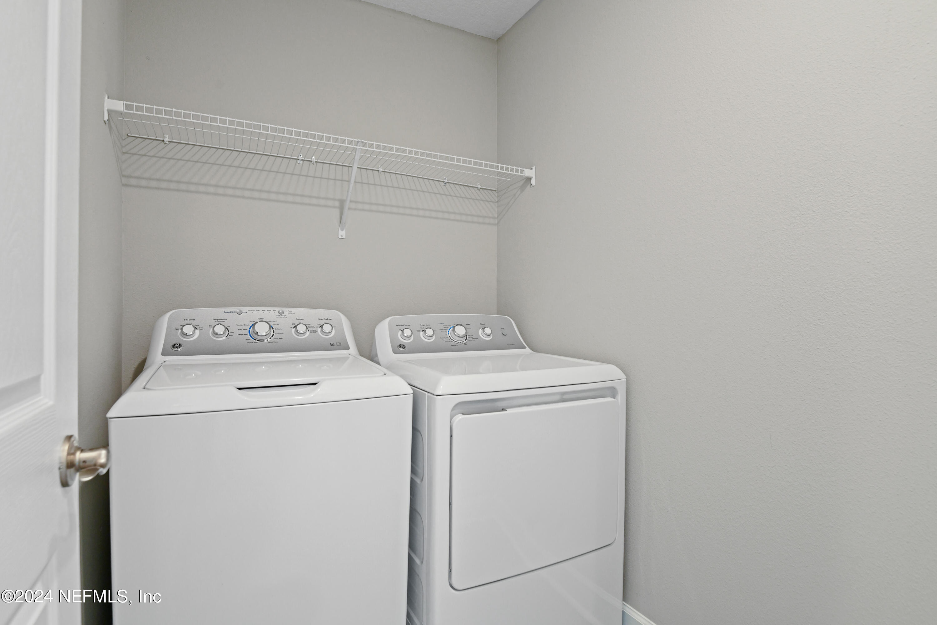29 Cedar Elm Way St. Augustine, FL 32092 - Photo 13 of 28 a utility room with dryer and washer