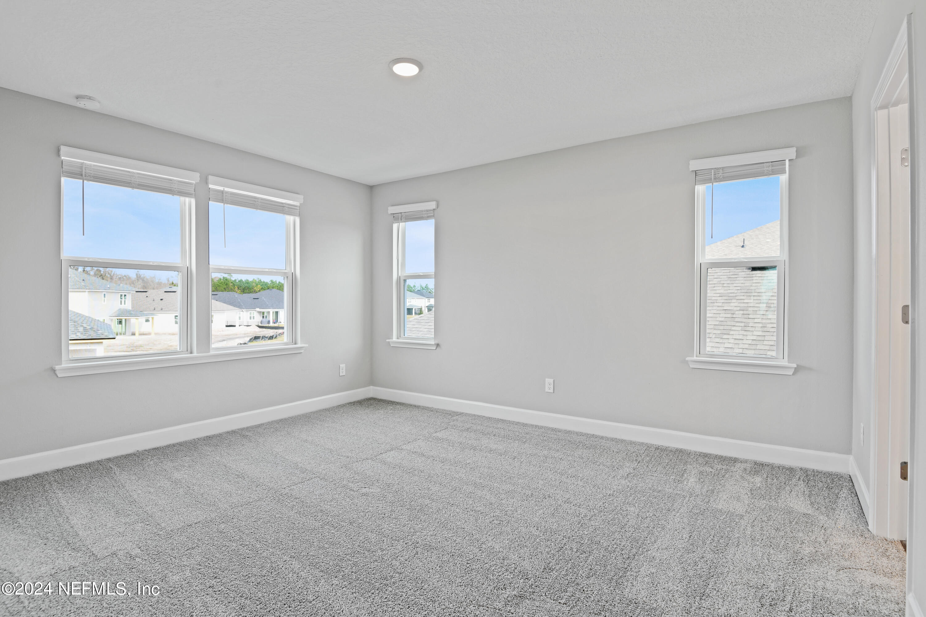 29 Cedar Elm Way St. Augustine, FL 32092 - Photo 14 of 28 a view of an empty room with a window