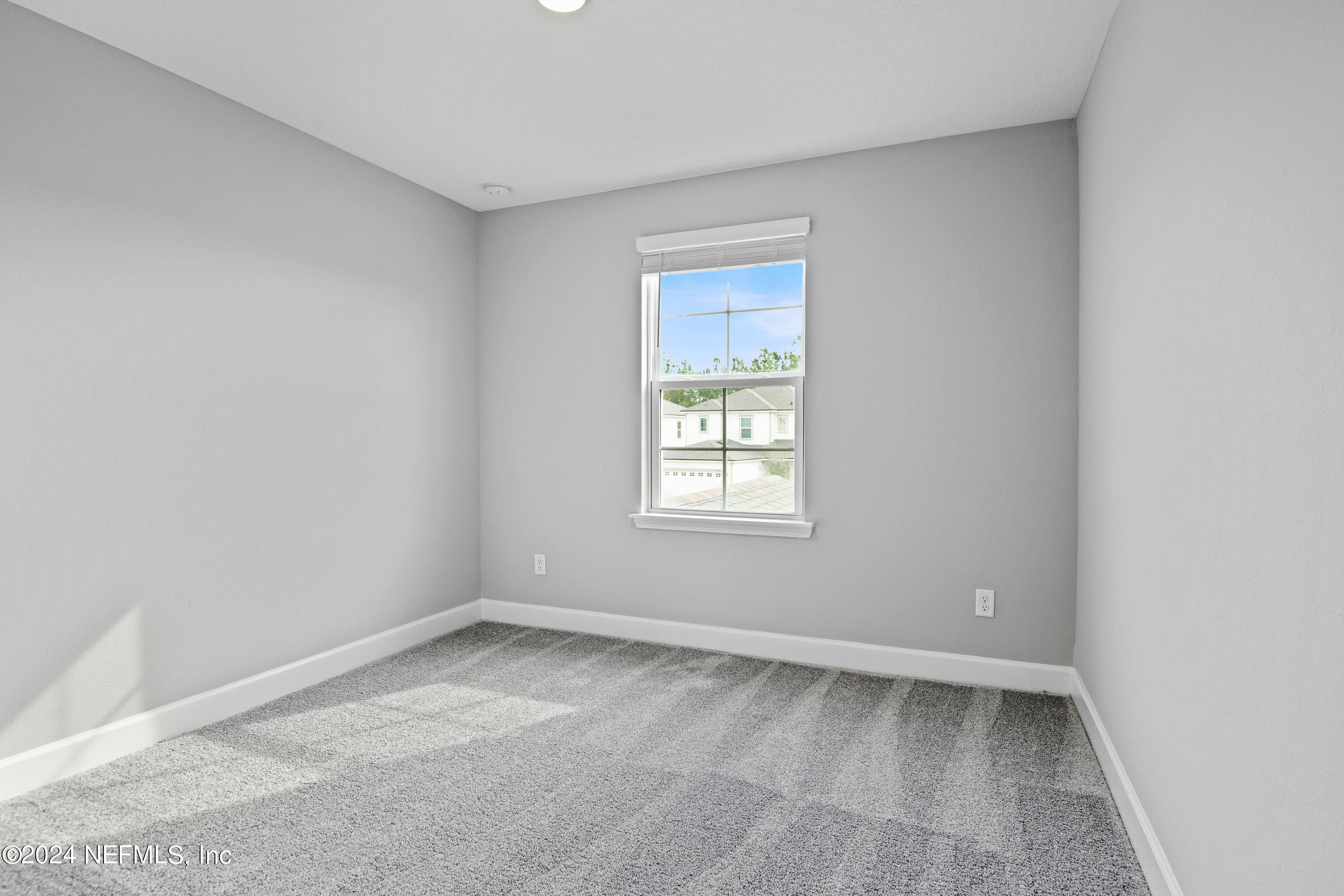 29 Cedar Elm Way St. Augustine, FL 32092 - Photo 17 of 28 an empty room with a window