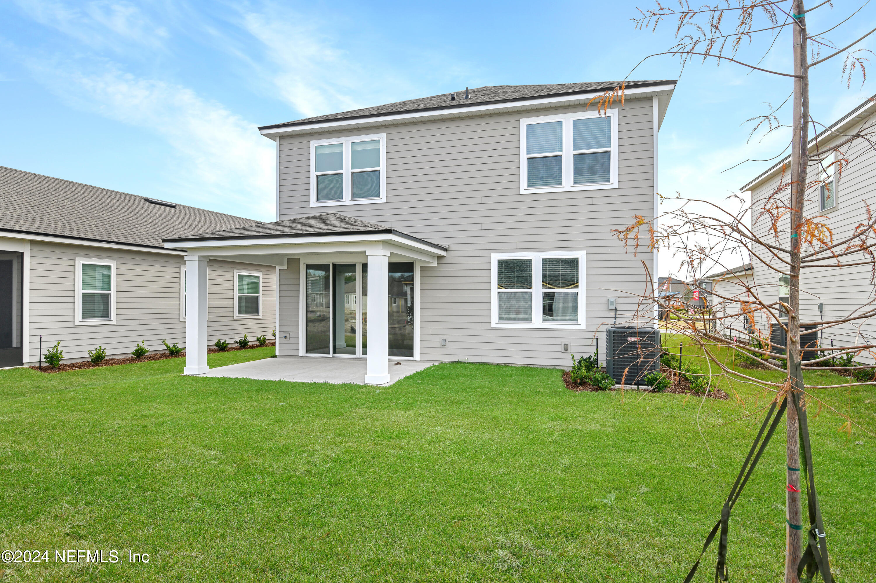 29 Cedar Elm Way St. Augustine, FL 32092 - Photo 19 of 28 a view of a house that has a garden