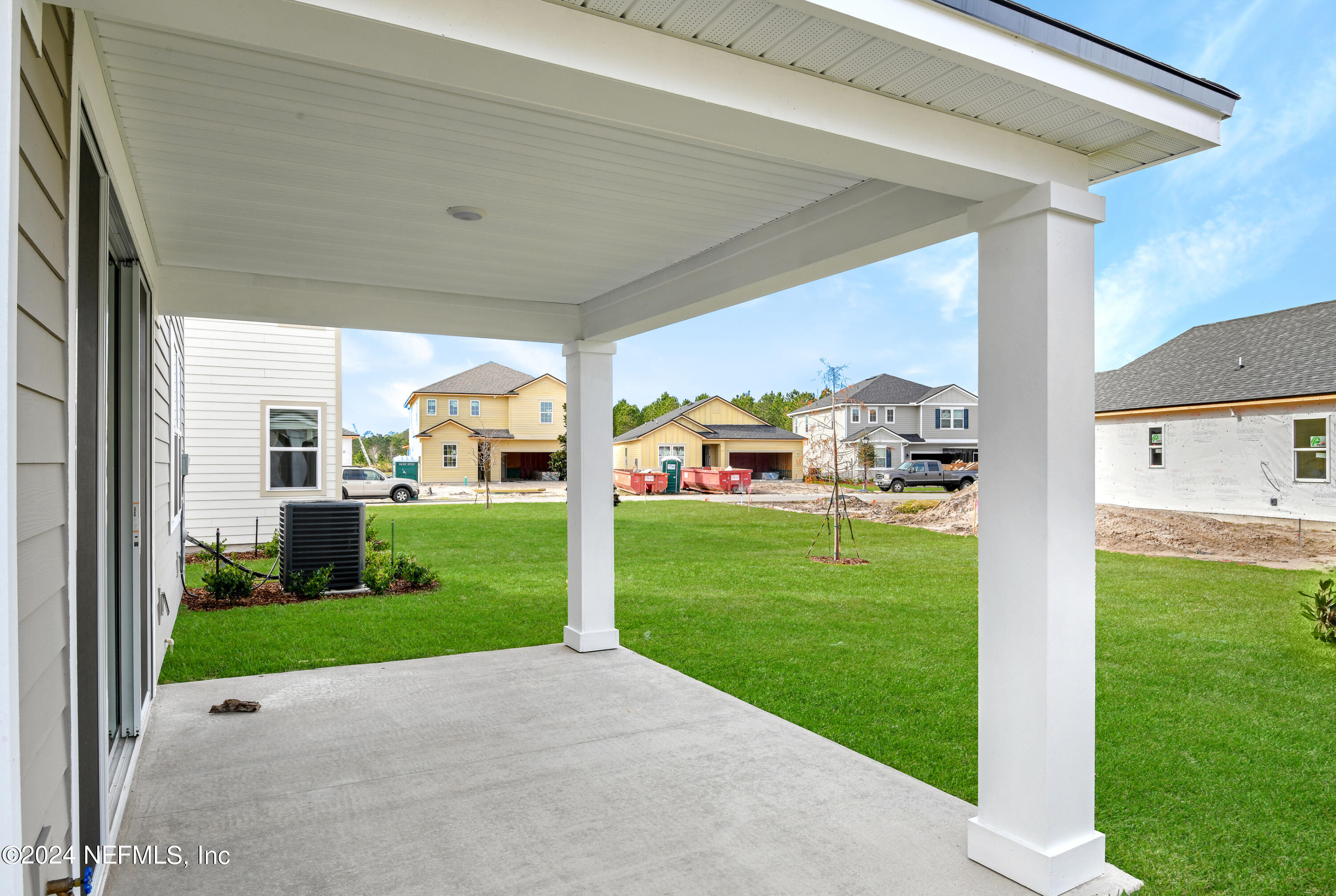 29 Cedar Elm Way St. Augustine, FL 32092 - Photo 20 of 28 a view of a house with backyard porch and garden