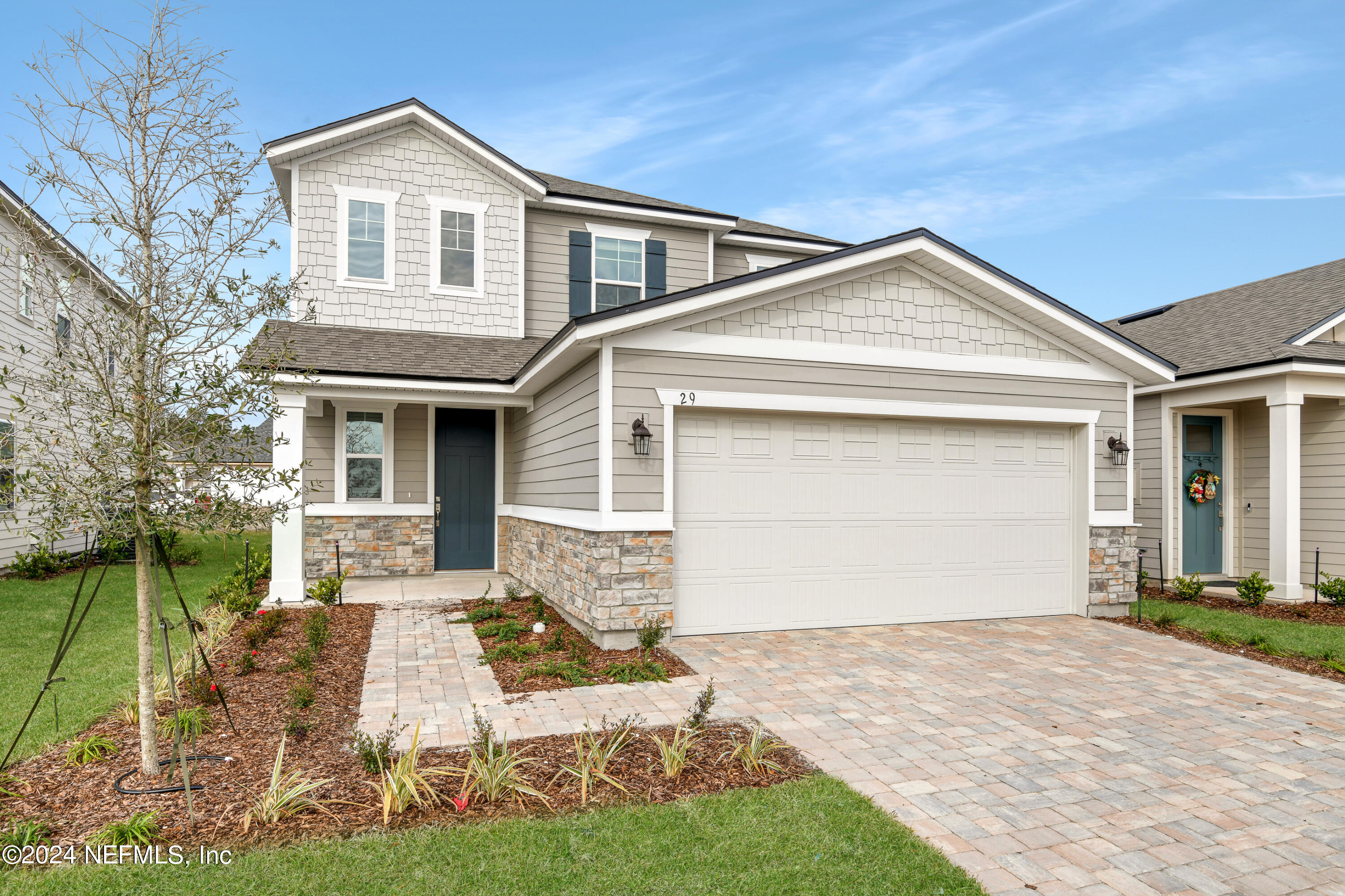 29 Cedar Elm Way St. Augustine, FL 32092 - Photo 2 of 28 a front view of a house with a yard