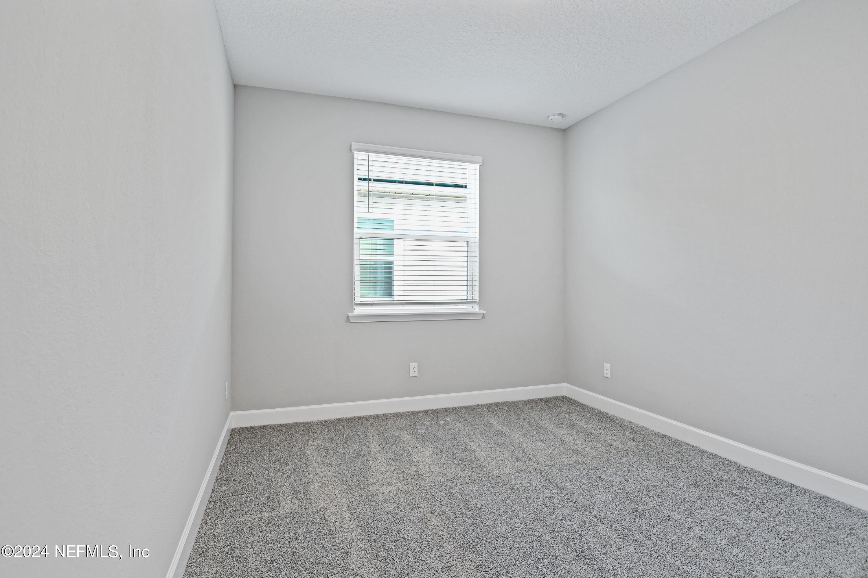 29 Cedar Elm Way St. Augustine, FL 32092 - Photo 10 of 28 an empty room with a window