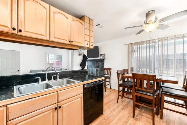 a kitchen with granite countertop a sink and counter space