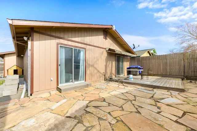 a view of a house with a patio