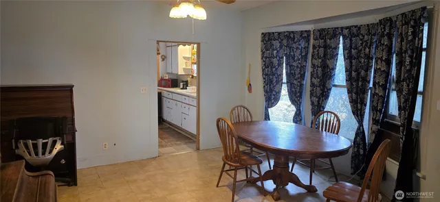 a view of a kitchen with refrigerator and washer