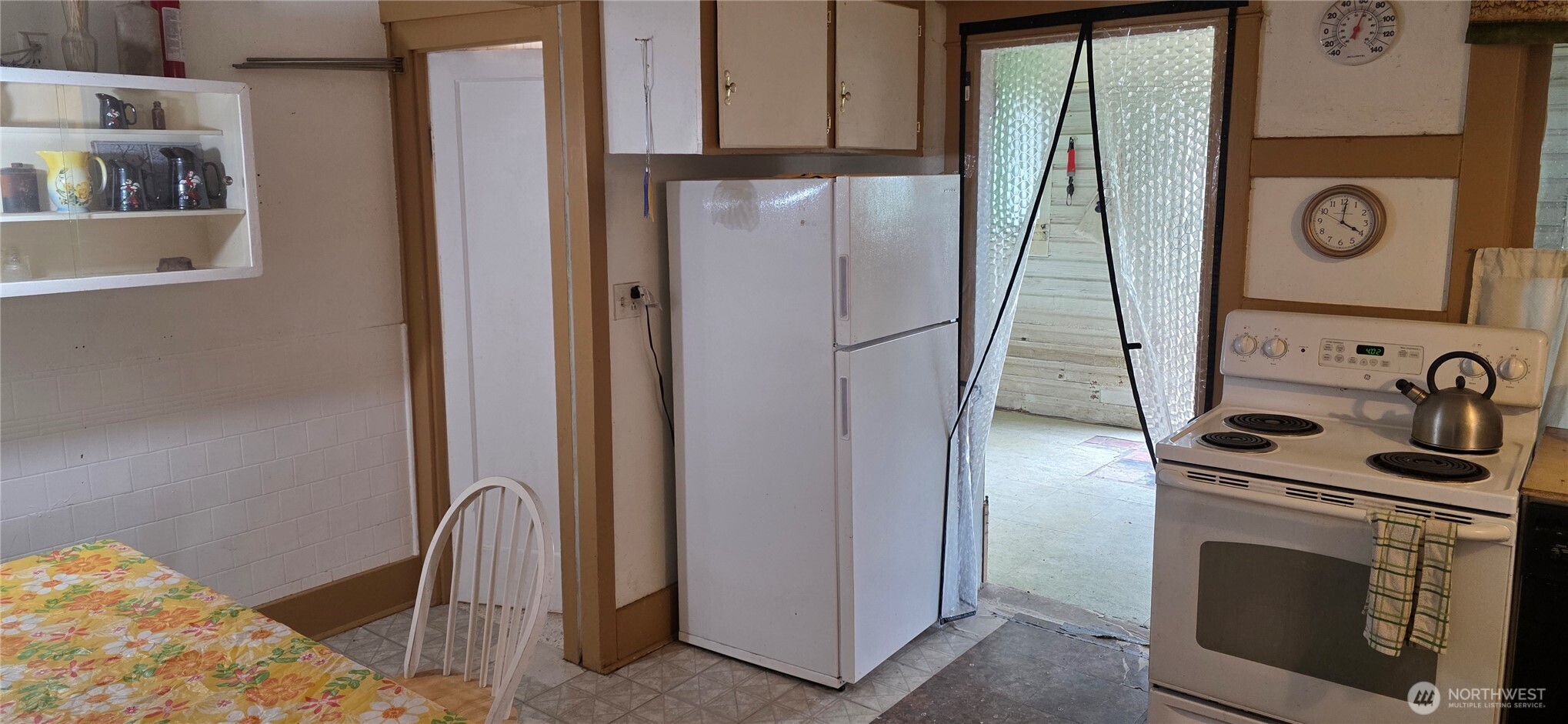 15841 Highway 2 Waterville, WA 98858 - Photo 12 of 40 a view of a kitchen with refrigerator and washer