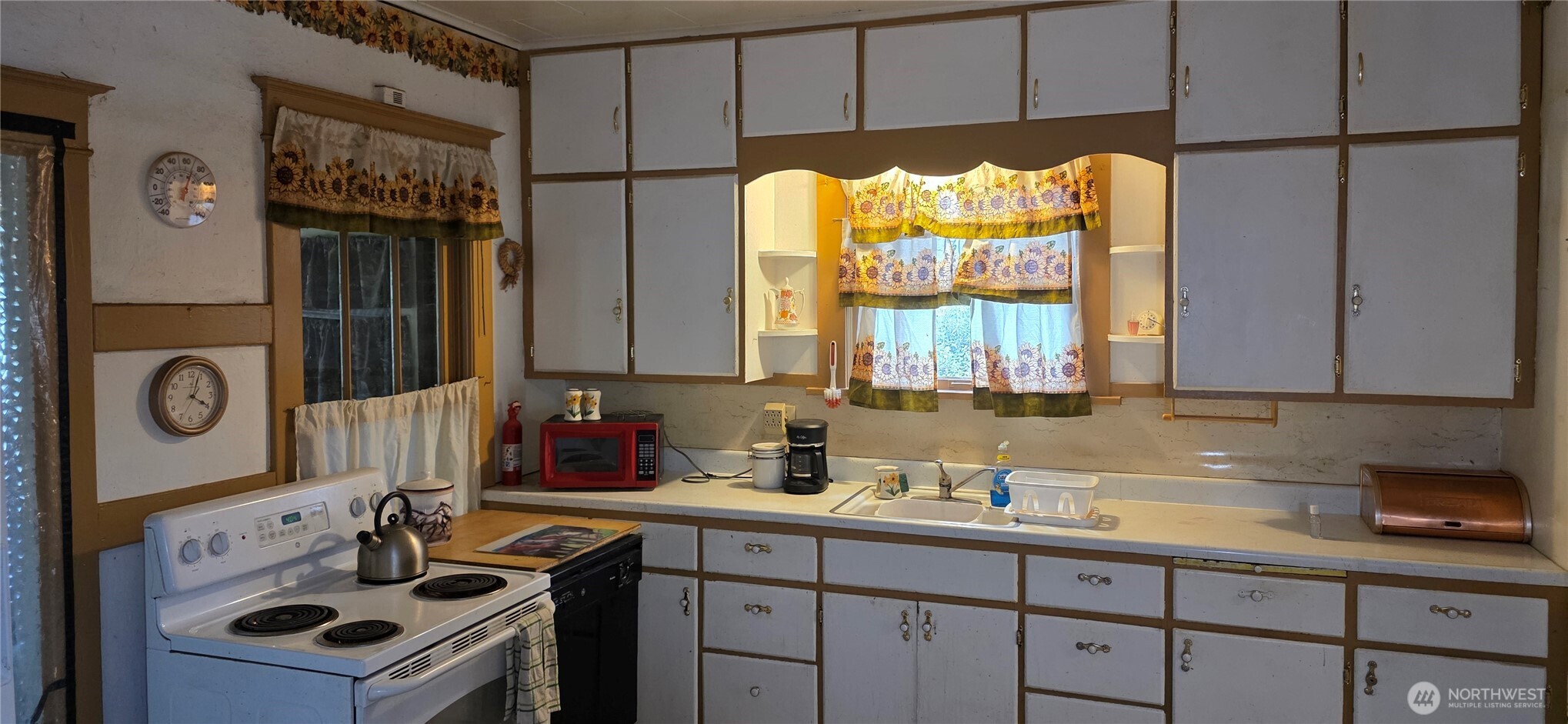 15841 Highway 2 Waterville, WA 98858 - Photo 18 of 40 a kitchen with sink cabinets and window
