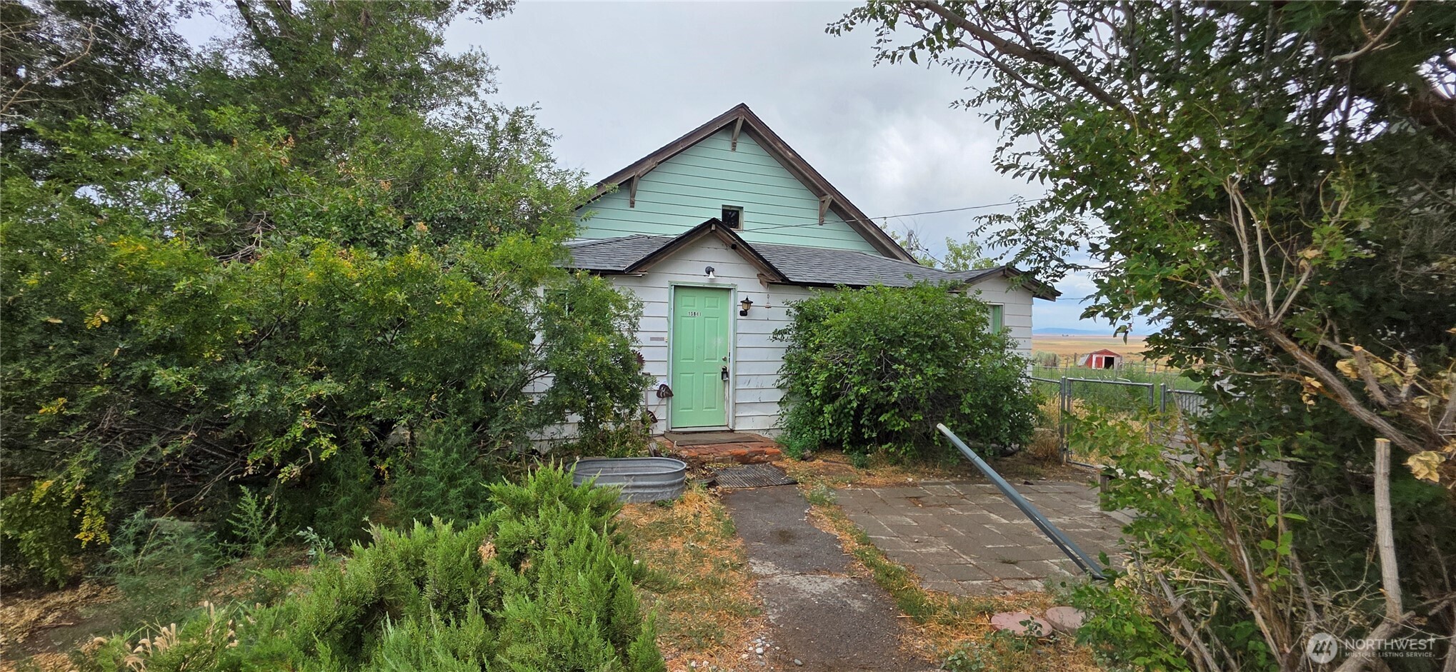 15841 Highway 2 Waterville, WA 98858 - Photo 2 of 40 a view of house with yard and green space