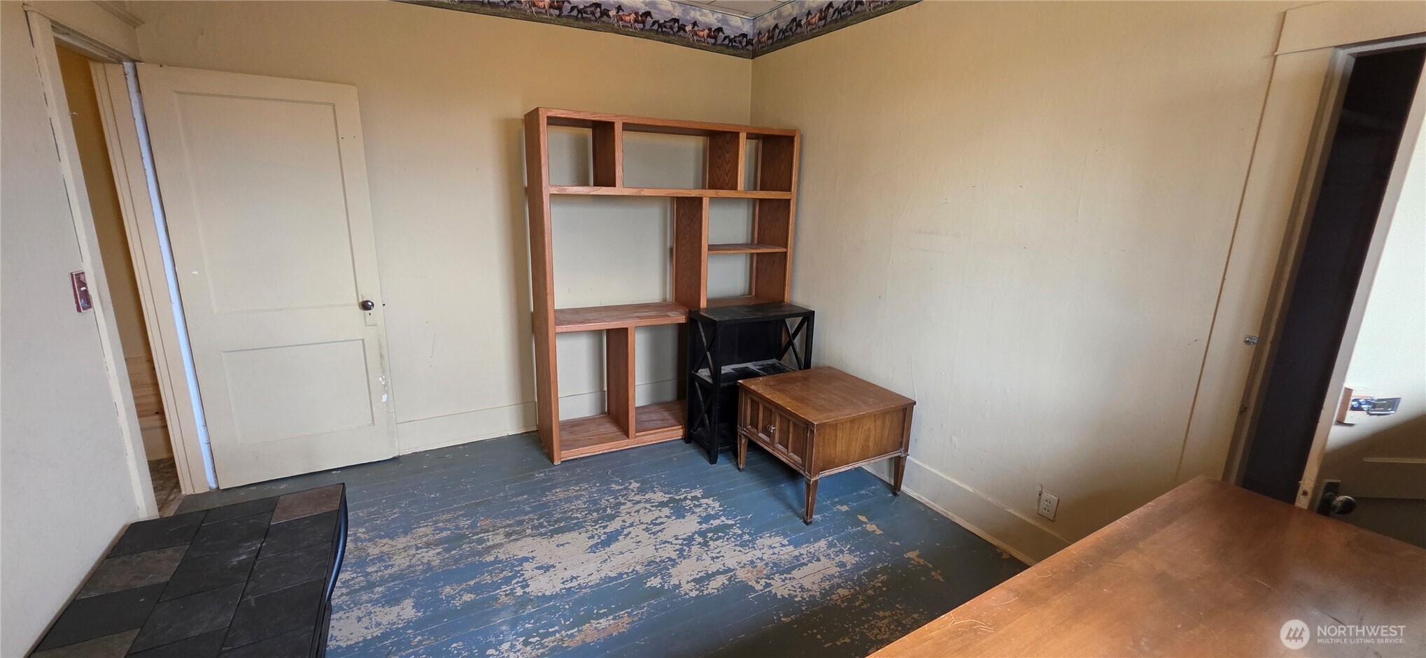 15841 Highway 2 Waterville, WA 98858 - Photo 21 of 40 a room that has a bed and a chair in it