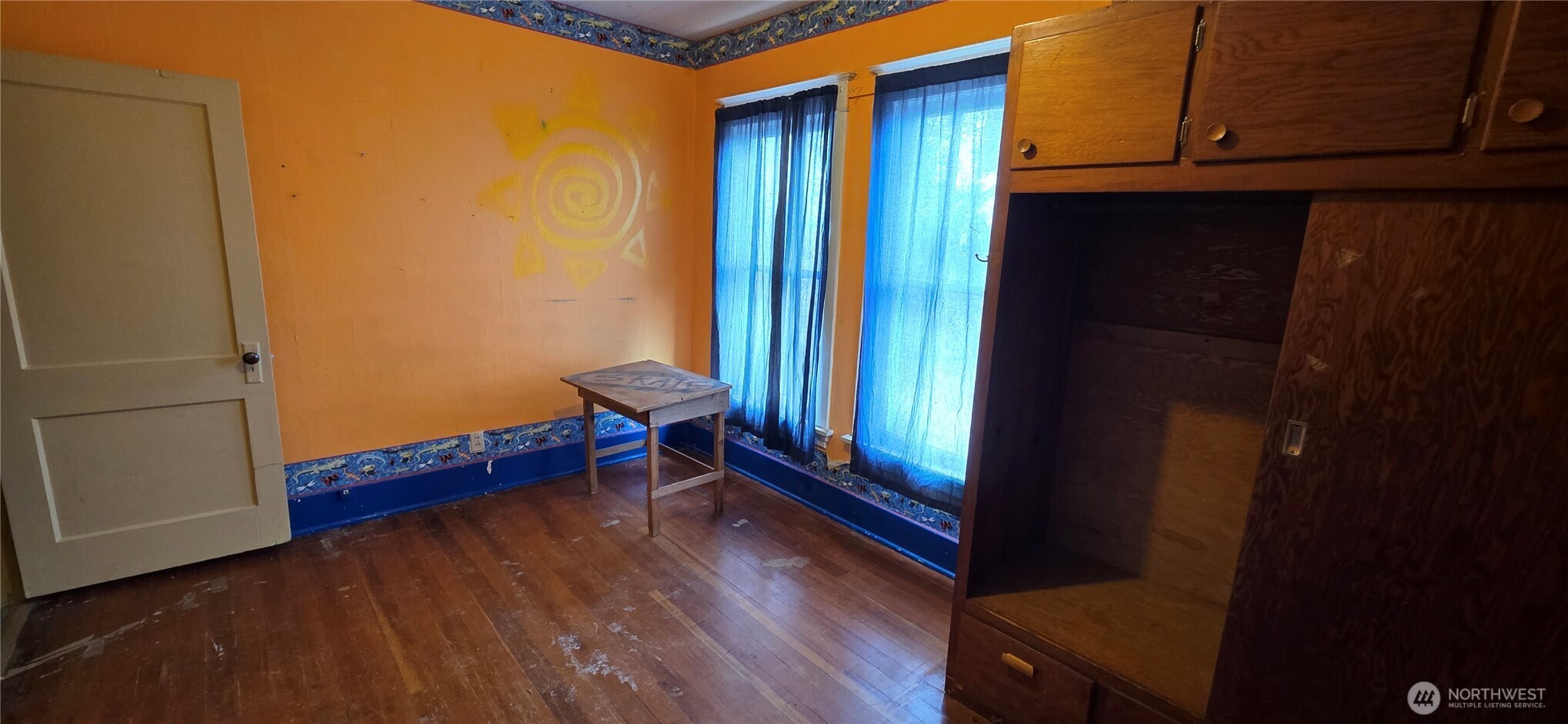 15841 Highway 2 Waterville, WA 98858 - Photo 26 of 40 a area with a window and wooden floor