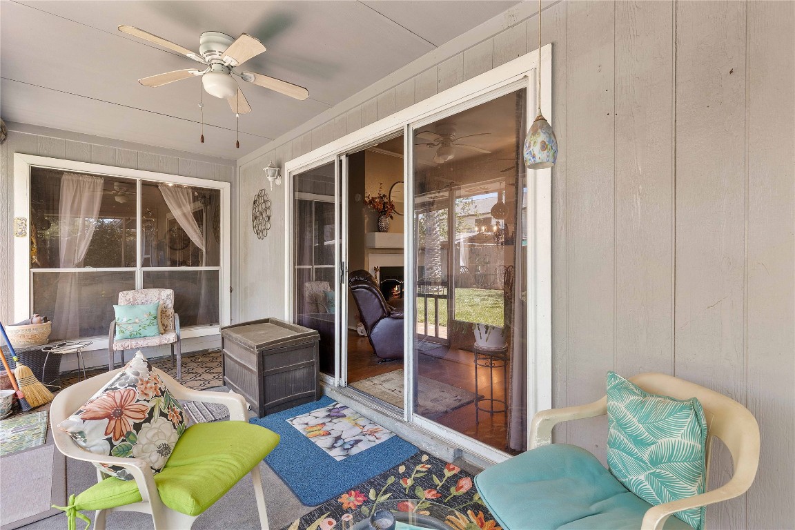 15730 Castorglen Drive Houston, TX 77598 - Photo 13 of 38 a living room with furniture and a floor to ceiling window