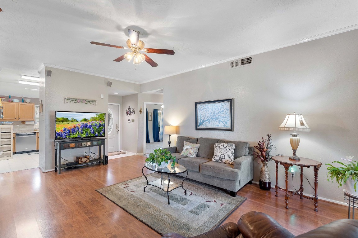15730 Castorglen Drive Houston, TX 77598 - Photo 19 of 38 a living room with furniture and a flat screen tv