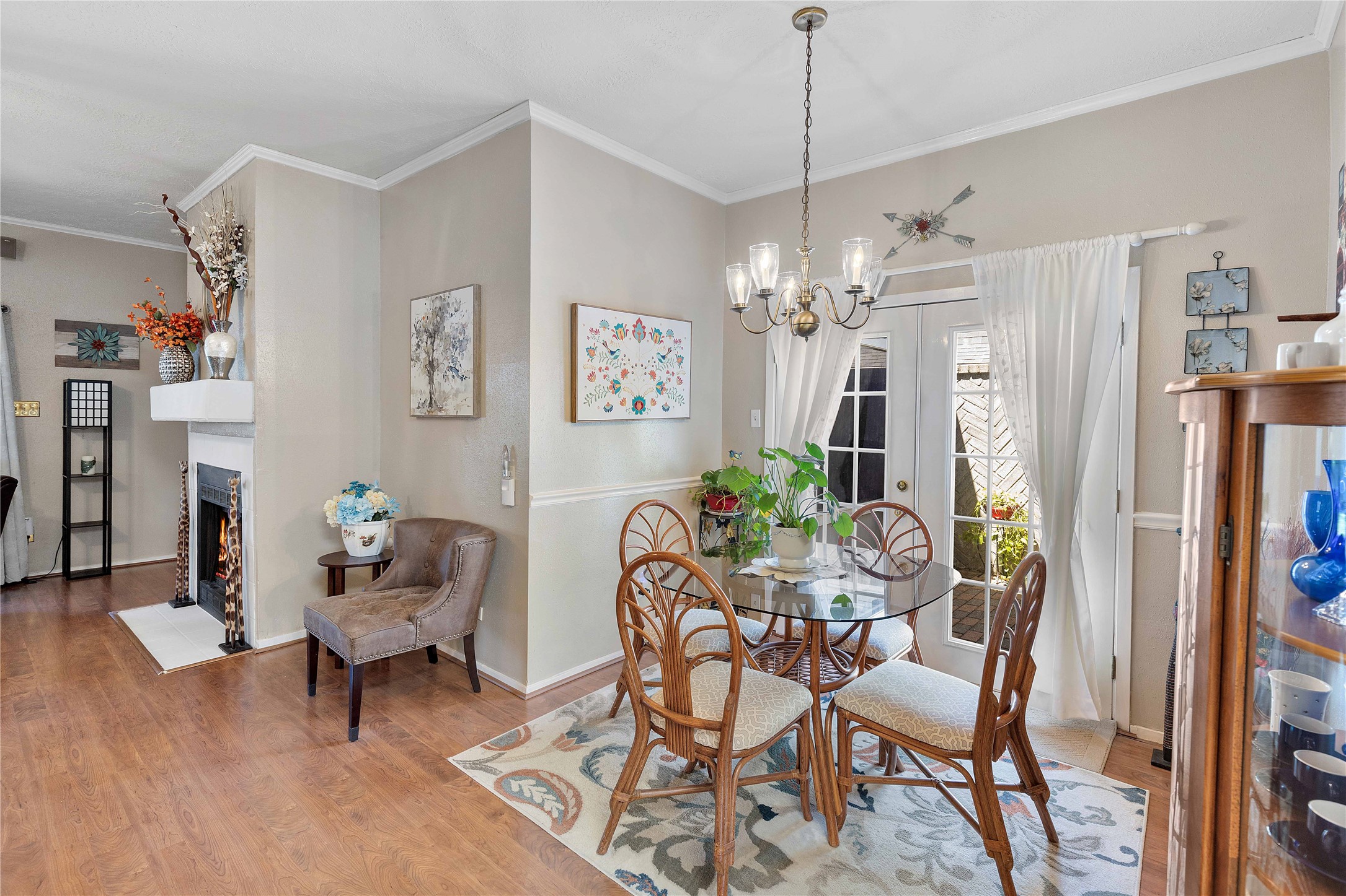 15730 Castorglen Drive Houston, TX 77598 - Photo 26 of 38 a view of a dining room with furniture and chandelier