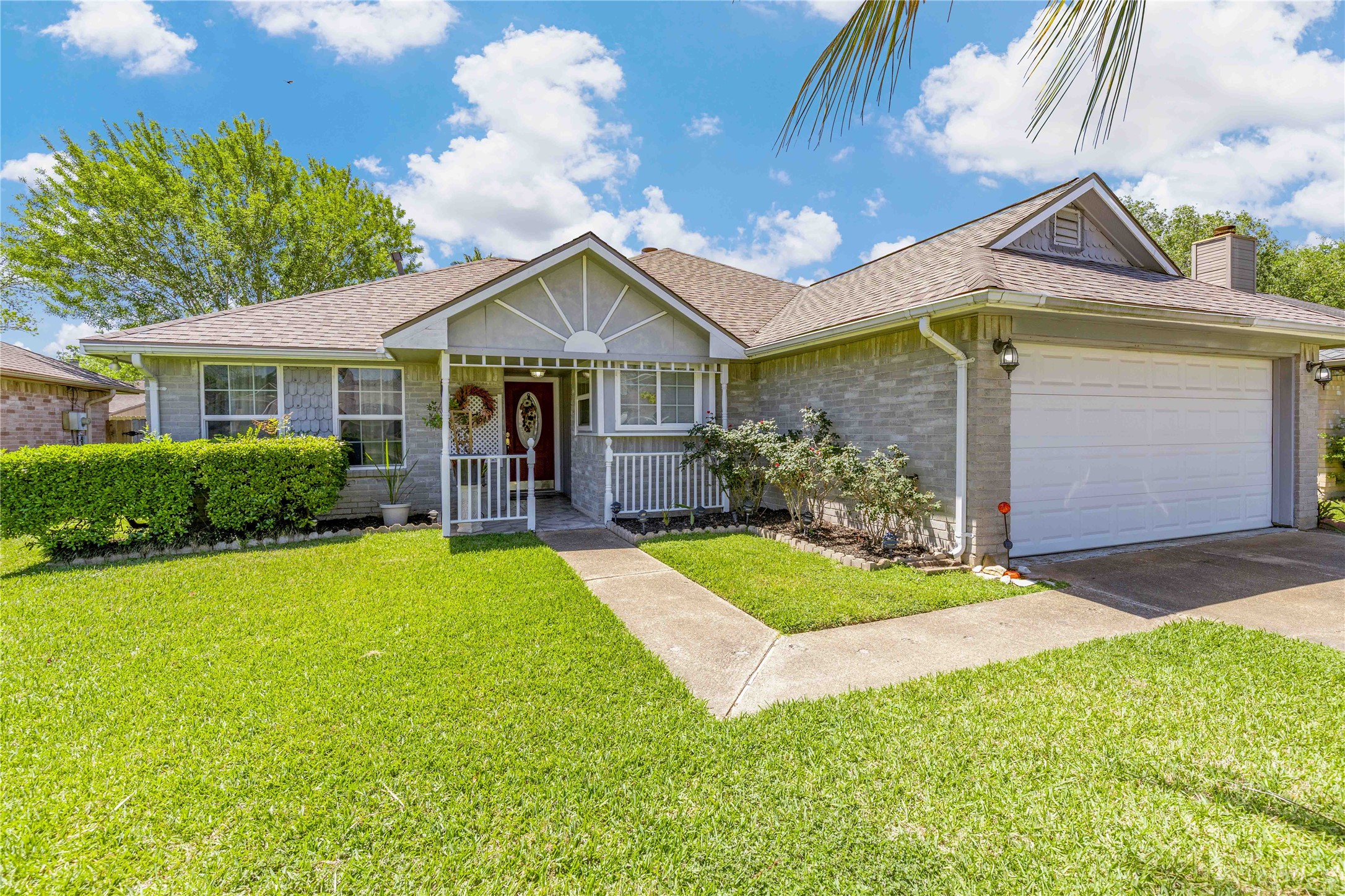 15730 Castorglen Drive Houston, TX 77598 - Photo 3 of 38 a view of a house with a yard and potted plants