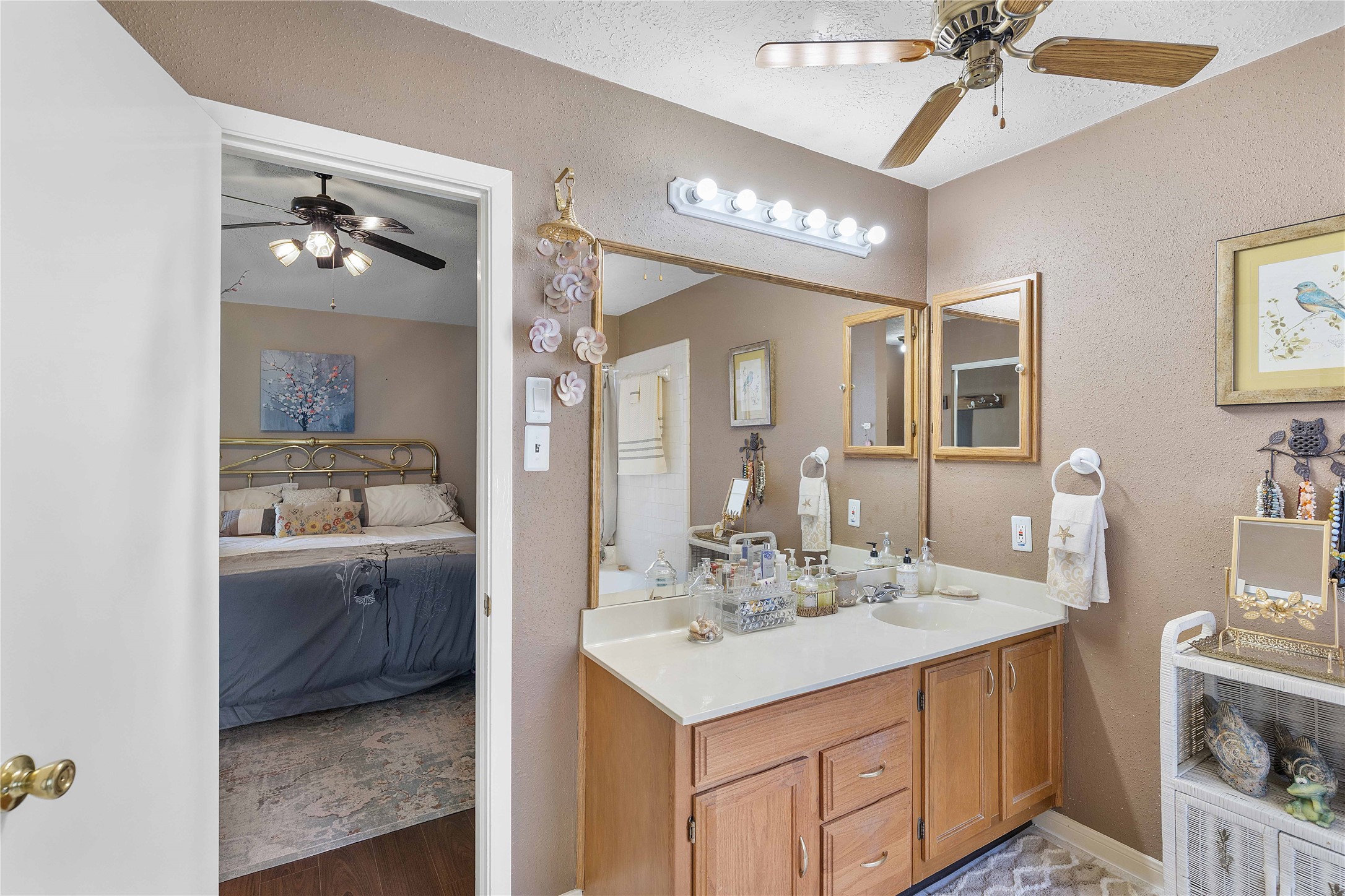 15730 Castorglen Drive Houston, TX 77598 - Photo 31 of 38 a en suite bathroom with a sink double vanity and a mirror