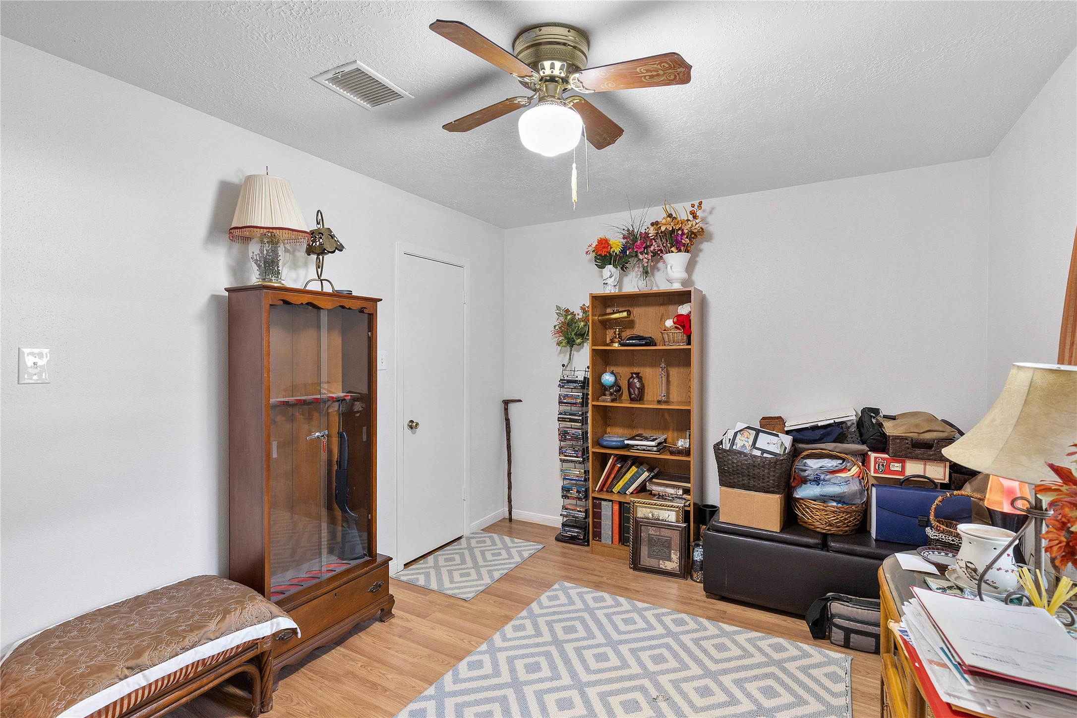 15730 Castorglen Drive Houston, TX 77598 - Photo 32 of 38 a living room with furniture and a window