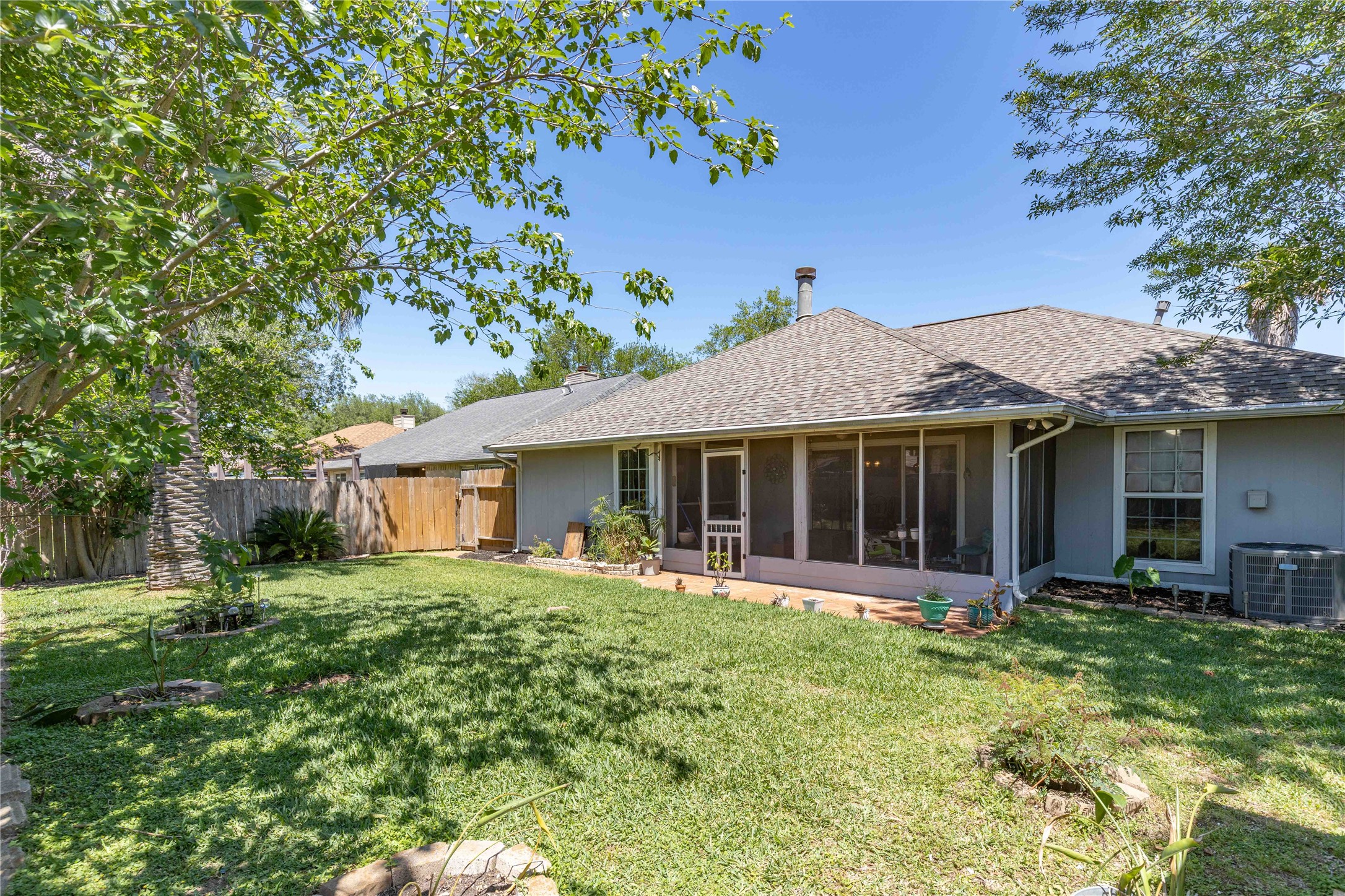 15730 Castorglen Drive Houston, TX 77598 - Photo 9 of 38 front view of a house with a yard