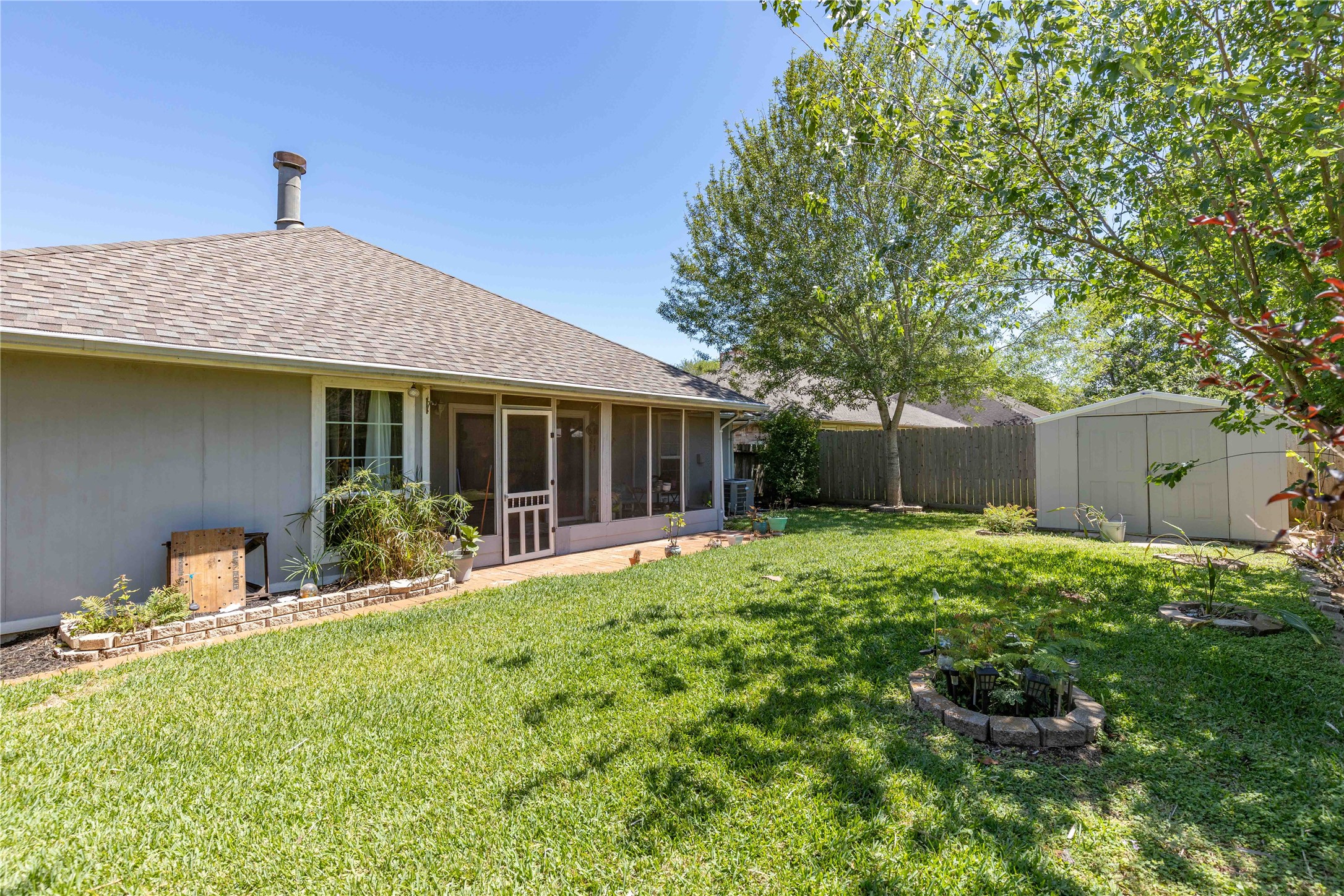 15730 Castorglen Drive Houston, TX 77598 - Photo 10 of 38 a front view of house with yard and green space