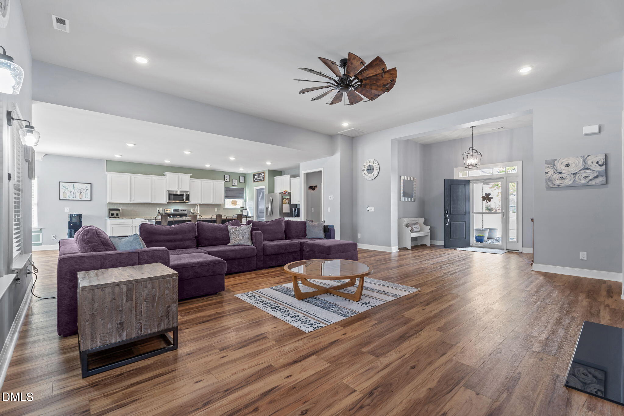 9405 Whitley Road Bailey, NC 27807 - Photo 11 of 51 a living room with furniture and a wooden floor