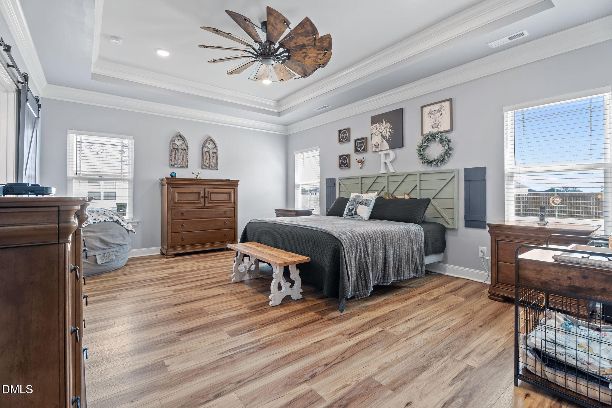 9405 Whitley Road Bailey, NC 27807 - Photo 22 of 51 a bedroom with a bed and wooden floor