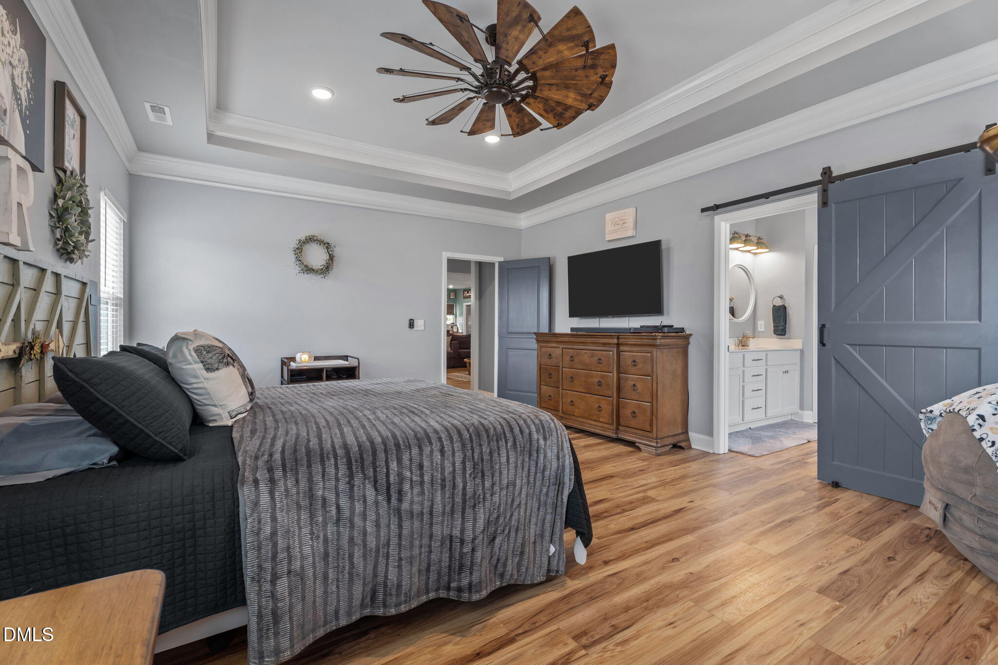 9405 Whitley Road Bailey, NC 27807 - Photo 24 of 51 a bedroom with a bed and a television on desk
