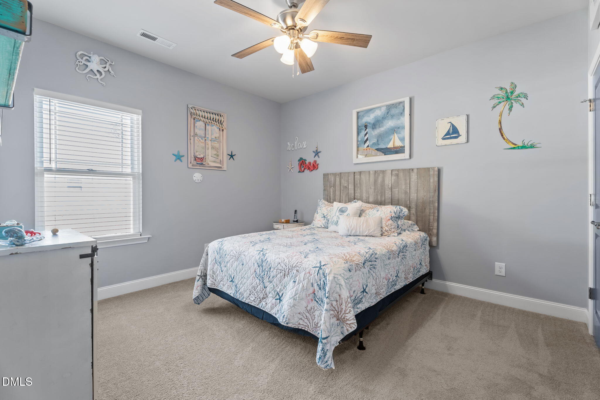 9405 Whitley Road Bailey, NC 27807 - Photo 34 of 51 a spacious bedroom with a bed and a window