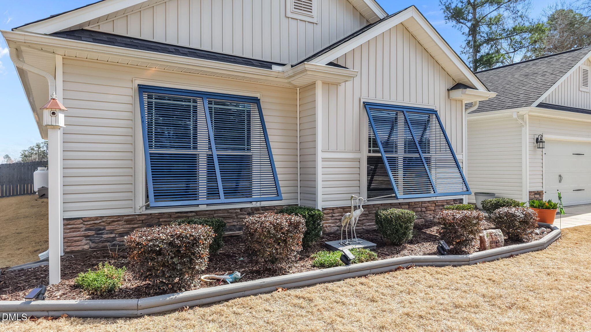 9405 Whitley Road Bailey, NC 27807 - Photo 5 of 51 a view of brick house with potted plants