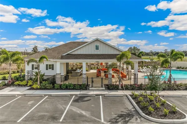 aerial view of a house with a ocean view