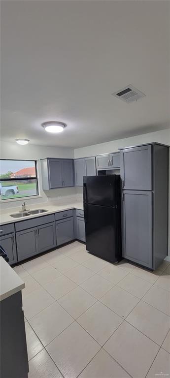 303 South Ridge Lane, Unit 1 San Juan, TX 78589 - Photo 6 of 6 a view of an empty room with wooden cabinets