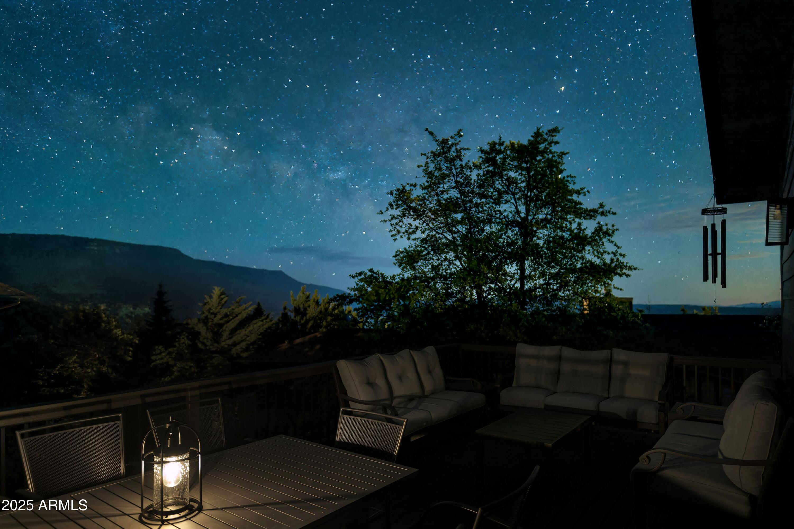 6564 Spirit Trail Pine, AZ 85544 - Photo 21 of 28 Patio Night_Trendy Pine LodgeHR