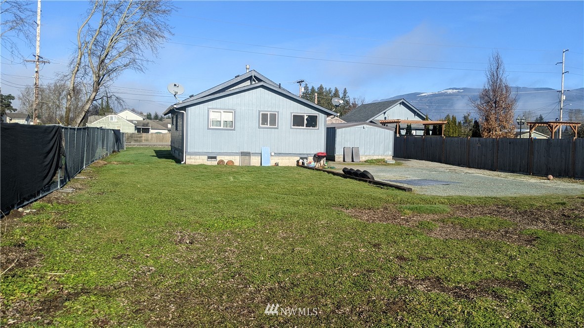 843 Cook Road Sedro-Woolley, WA 98284 - Photo 6 of 8 a view of a house with a yard and pathway