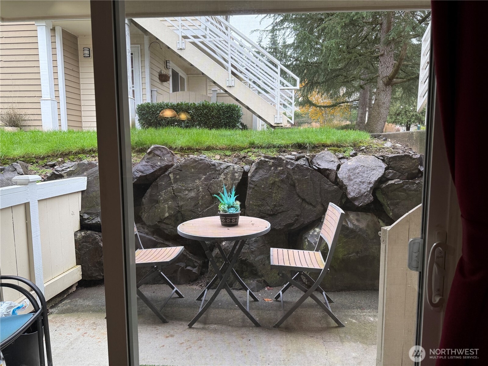 21301 52nd Avenue West, Unit B112 Mountlake Terrace, WA 98043 - Photo 11 of 17 a view of a outdoor seating area